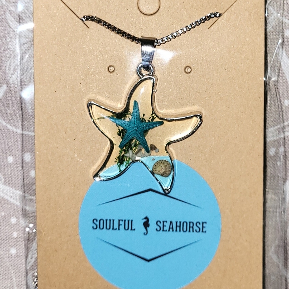 Teal starfish clear necklace